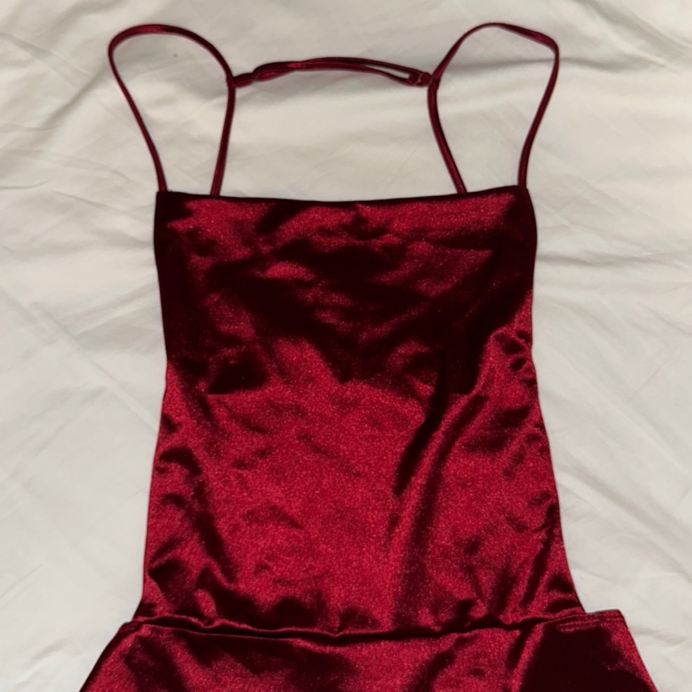 Red open back body suit